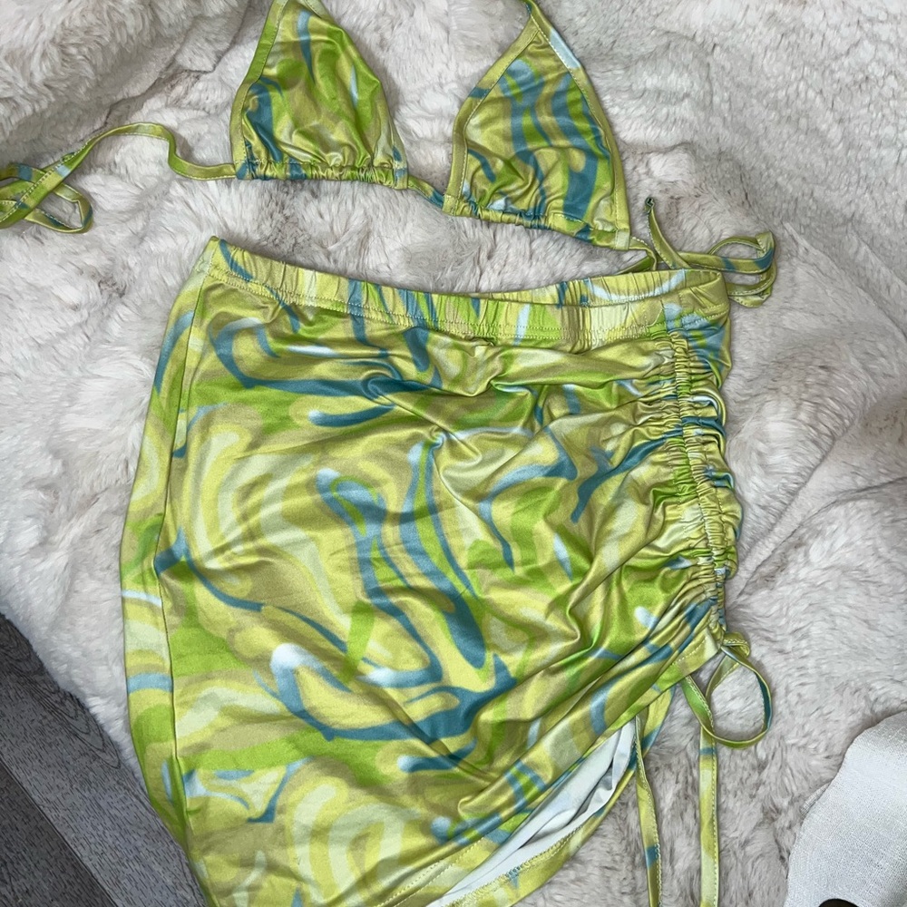 Two piece set. Bikini top w/cover up